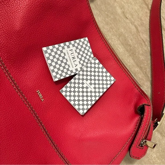 Brand new Furla (Italian brand) leather shoulder bag, with dust bag and tag